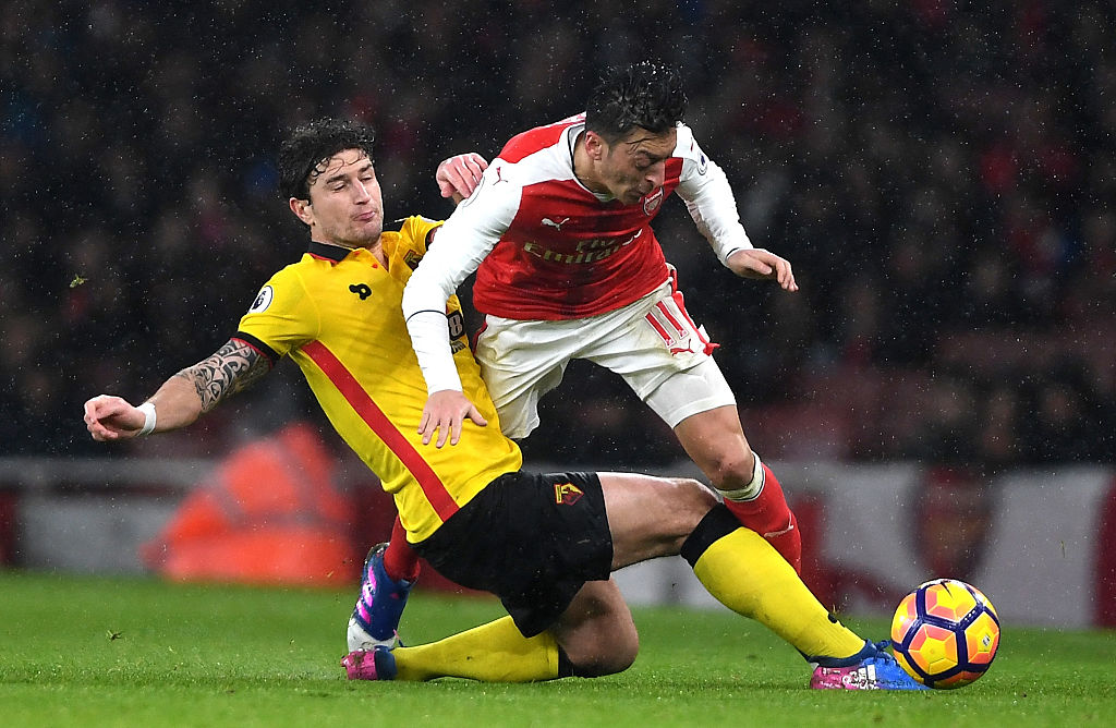 Mesut Ozil, Daryl Janmaat Mesut Ozil, Daryl Janmaat