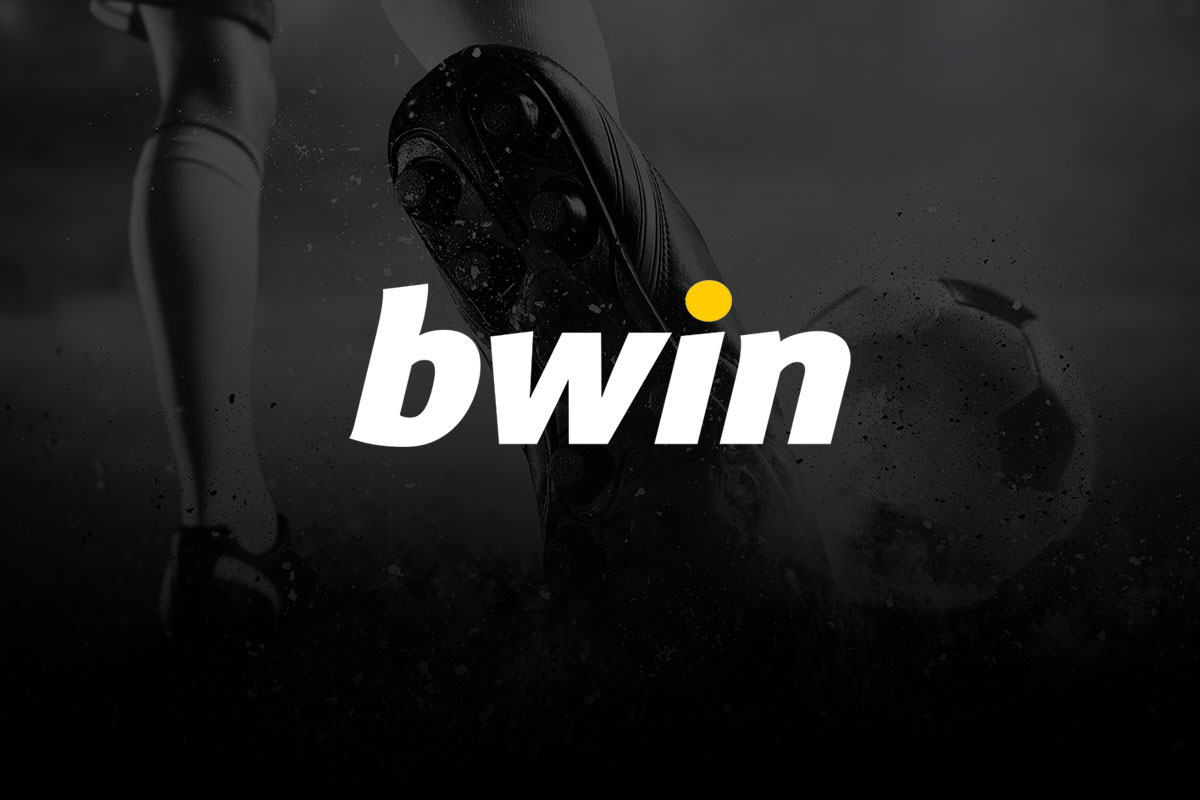 Imagem grfica de divulgao da bwin com logo em tons de branco e amarelo sobrepondo foto em preto e branco no fundo das pernas de um jogador de futebol. 